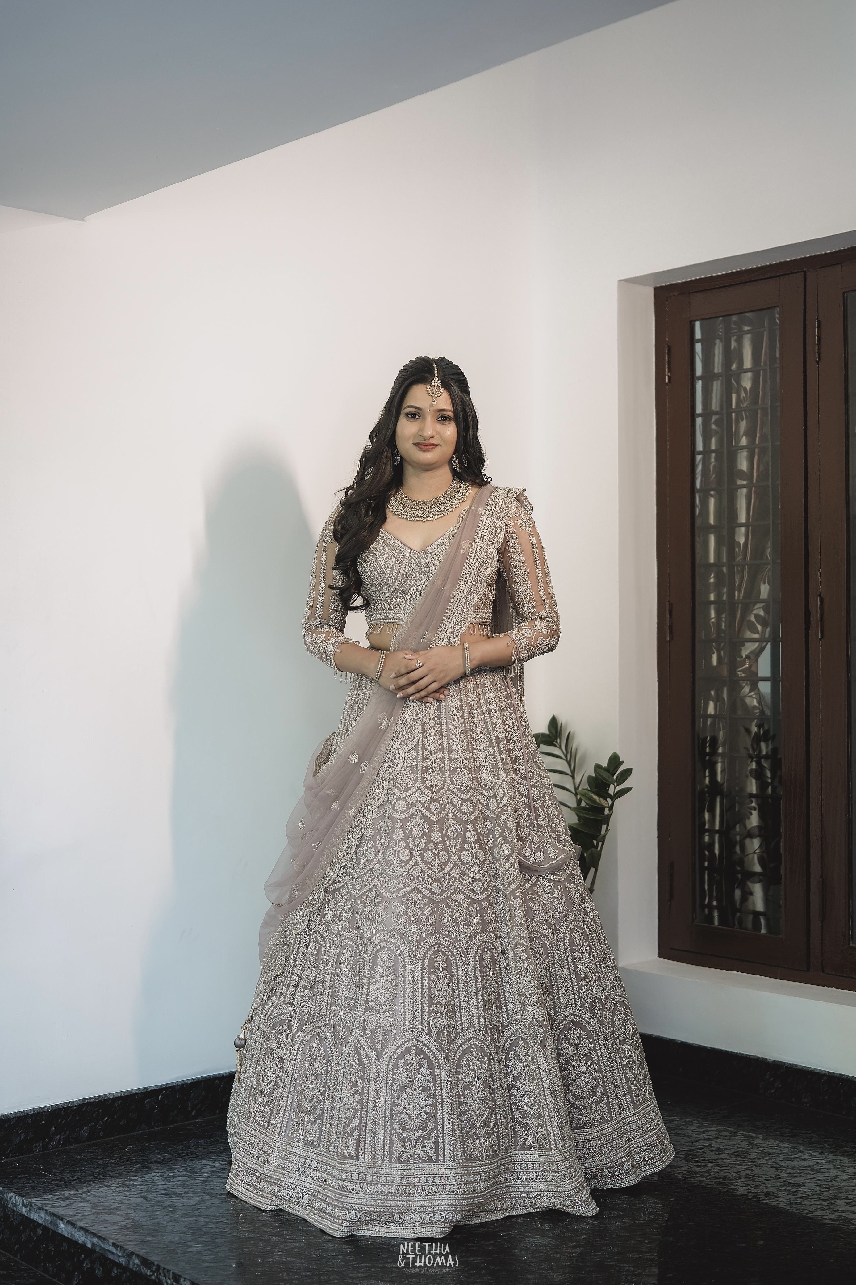 Pale Dusty Rose Lehenga With Zari Work Embellishment1