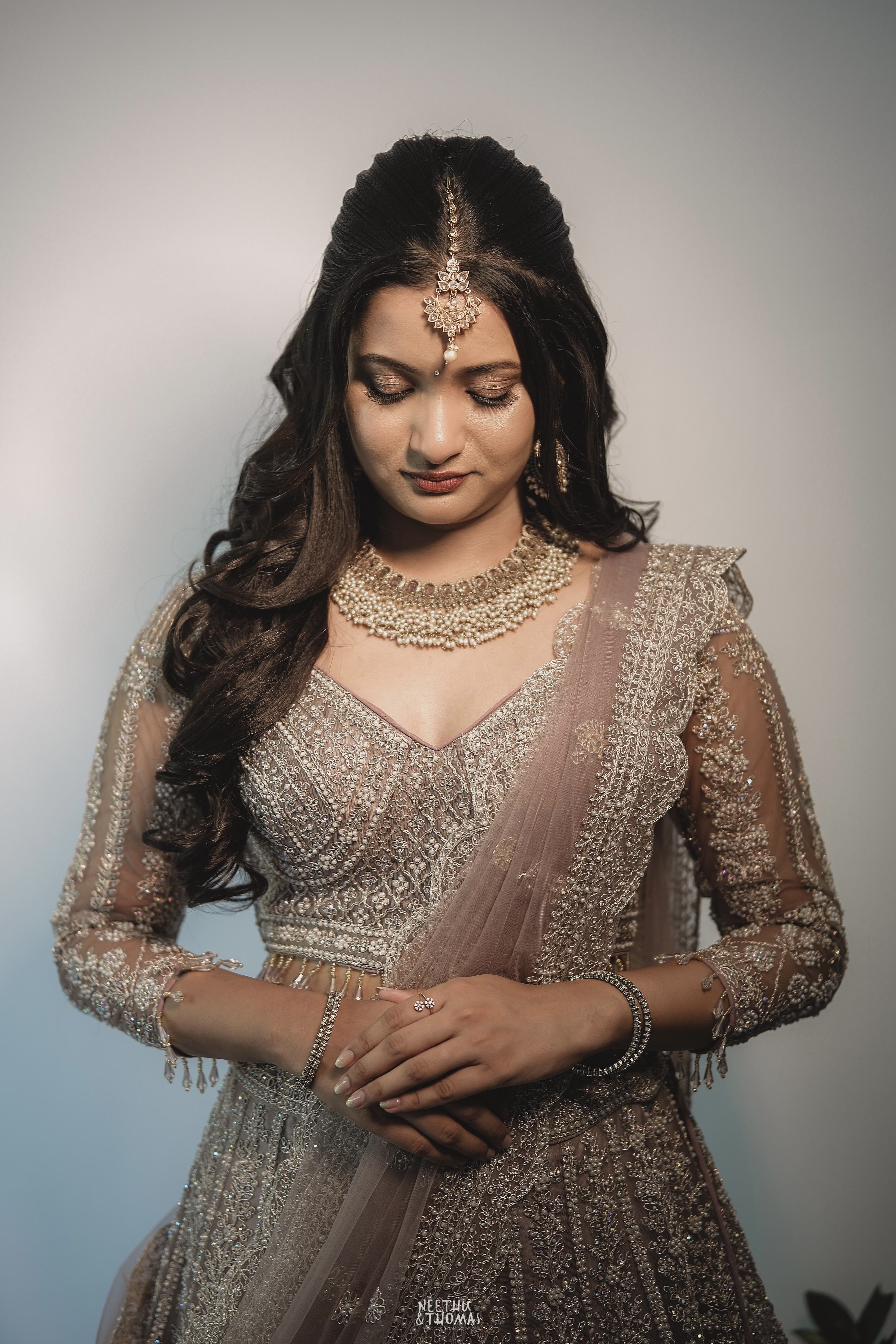 Pale Dusty Rose Lehenga With Zari Work Embellishment3