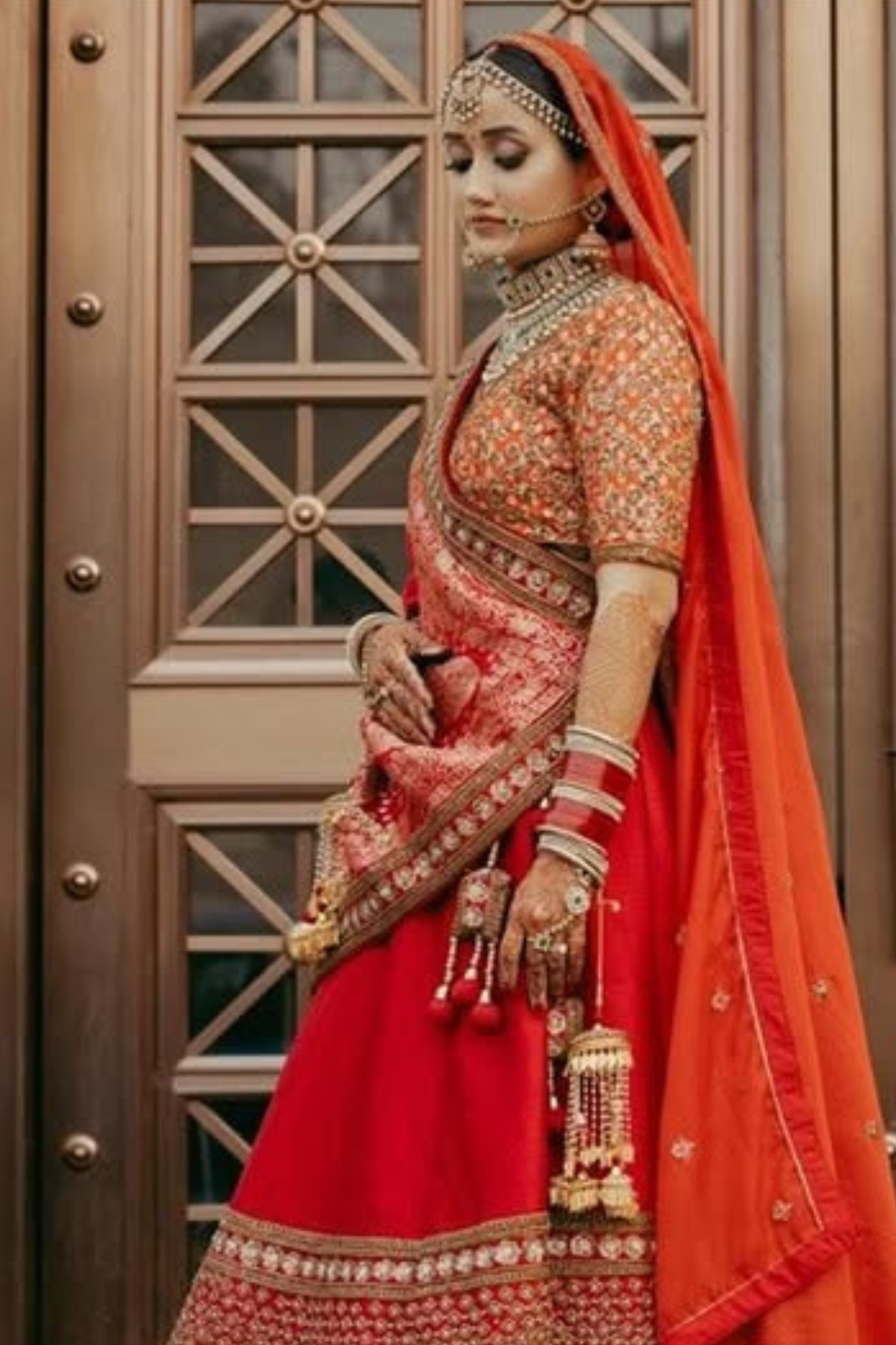 Cherry Red Bridal lehenga With Golden Zari Work Embellishment2
