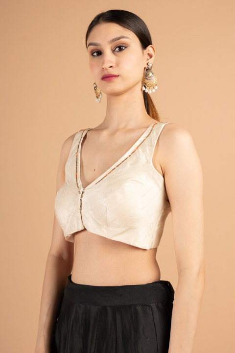Off-White Sleeveless Blouse