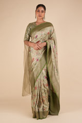 Strokes of flowers Green Saree