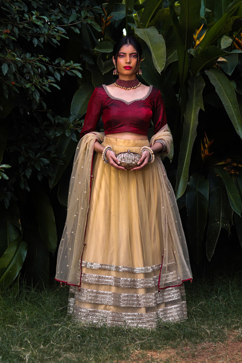 Maroon And Gold Net Lehenga