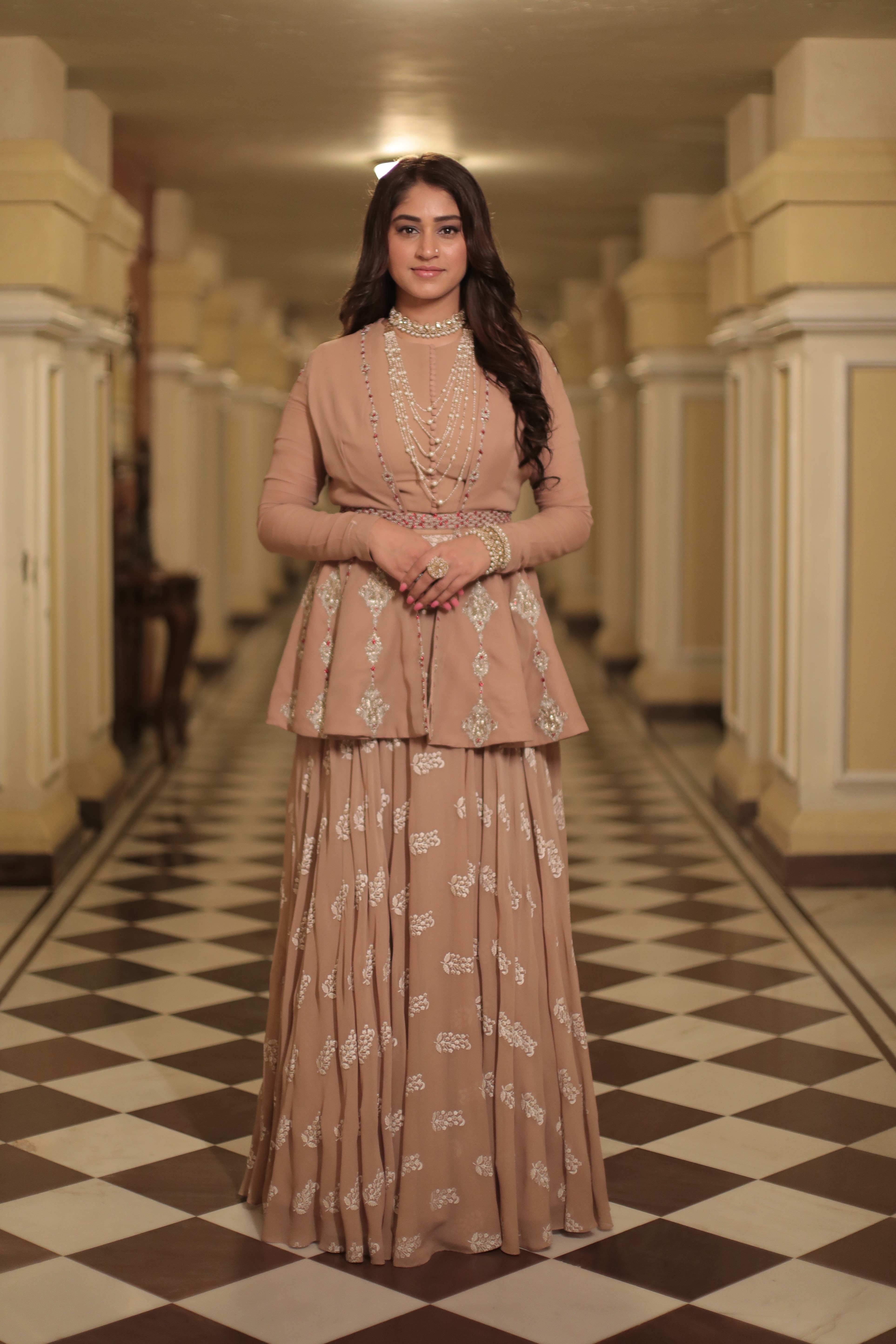 Beige Peplum Jacket And A Skirt Set