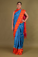 Blue Saree With Orange Border