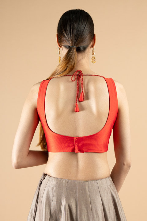 Red Sleeveless Blouse
