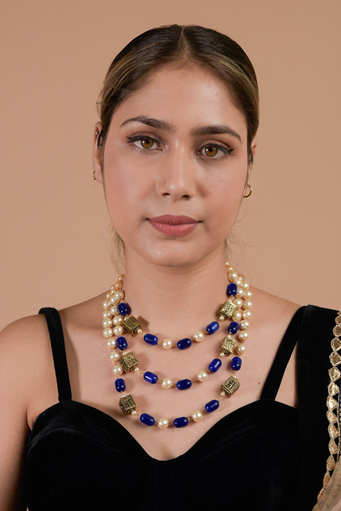 Blue and pearl Neckline