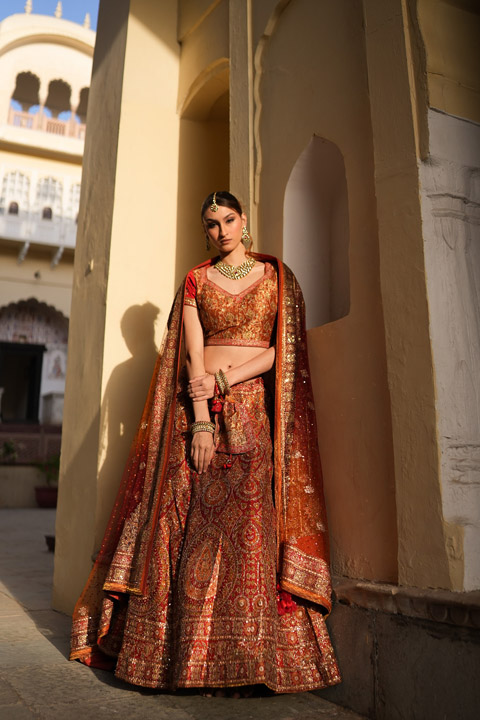 Maroon And Orange Embellished Lehenga