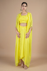 Yellow blouse and cape and draped skirt set