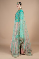 Marine green waist length blouse paired with peach lehenga setDSC08979