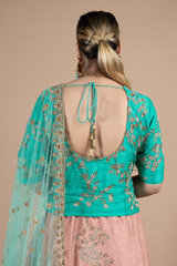 Marine green waist length blouse paired with peach lehenga setDSC08984