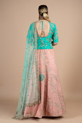 Marine green waist length blouse paired with peach lehenga setDSC08985