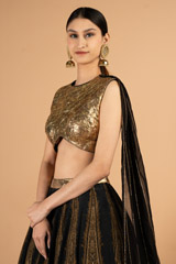 Printed skirt paired with gold blouse and detachable dupattaDSC04017