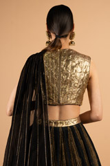 Printed skirt paired with gold blouse and detachable dupattaDSC04018