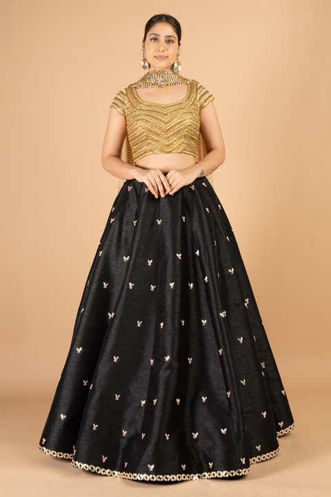Black and gold lehenga set