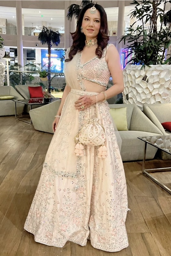 Peach Lehenga With Pastel Floral Embellishment