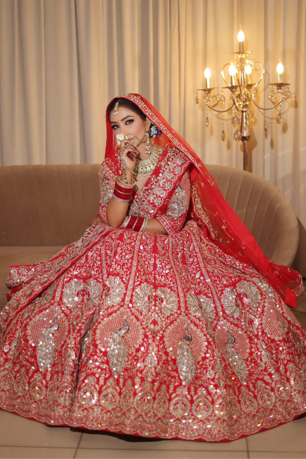 Red Bridal Lehenga In Peacock Floral Motif With Golden Zari Work Embellishment2