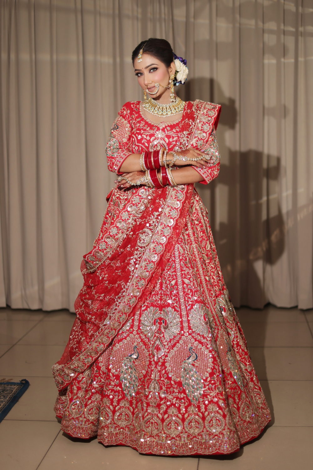 Red Bridal Lehenga In Peacock Floral Motif With Golden Zari Work Embellishment7
