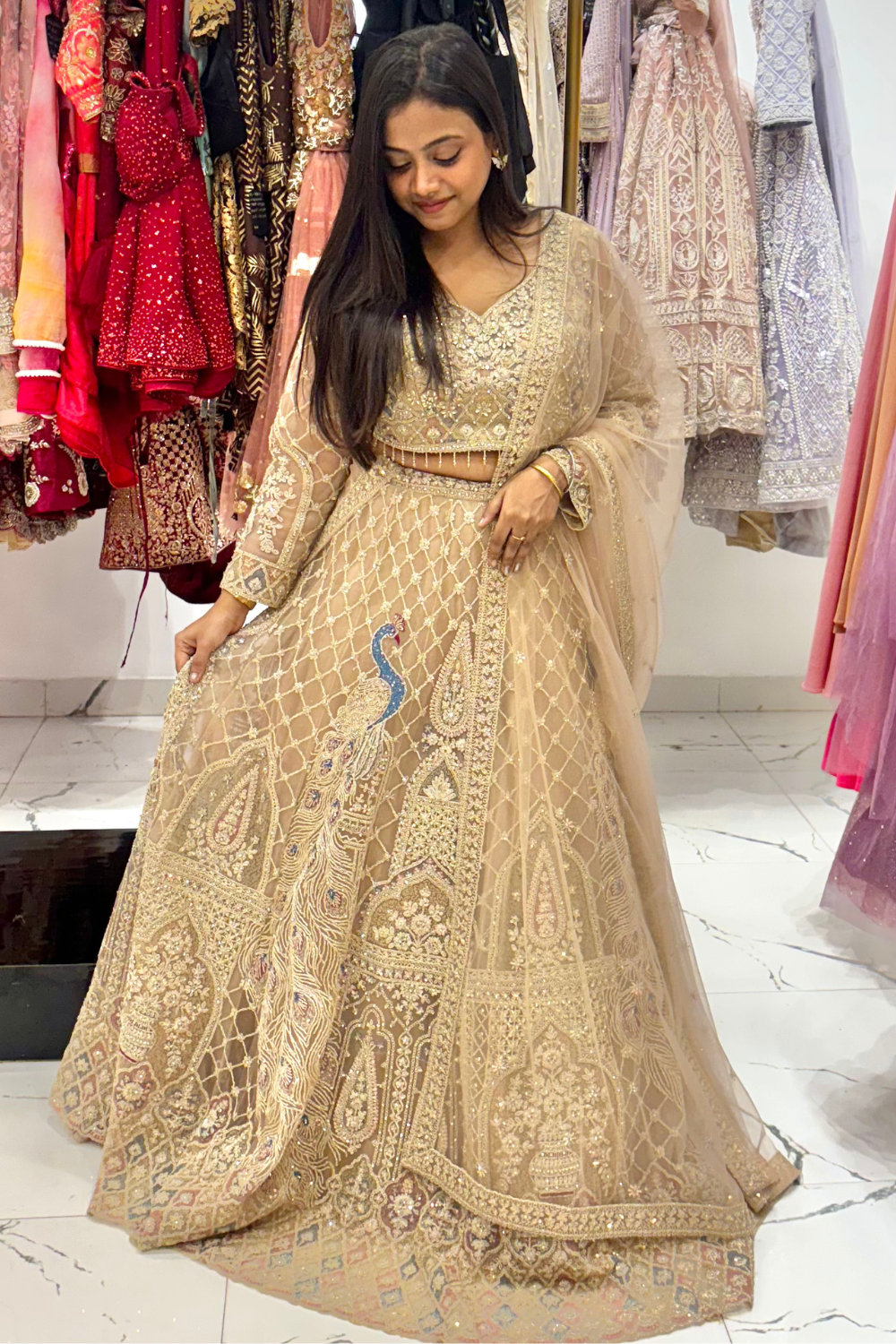 Soft Champagne Beige Lehenga With Peacock Motif Embellishment3