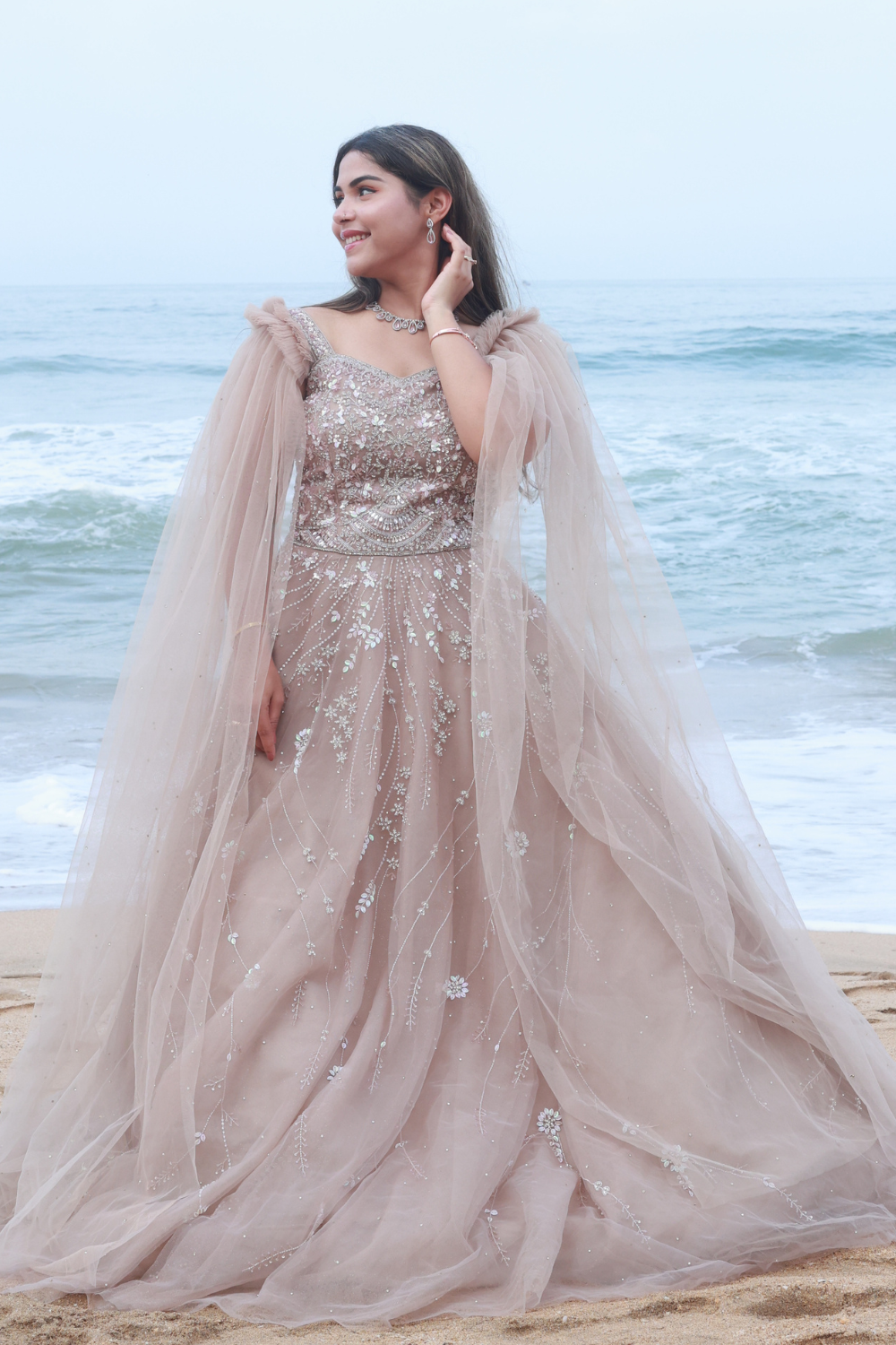 Nude Beige Gown With Shoulder Trails With Silver Pink Sequins Embellishment