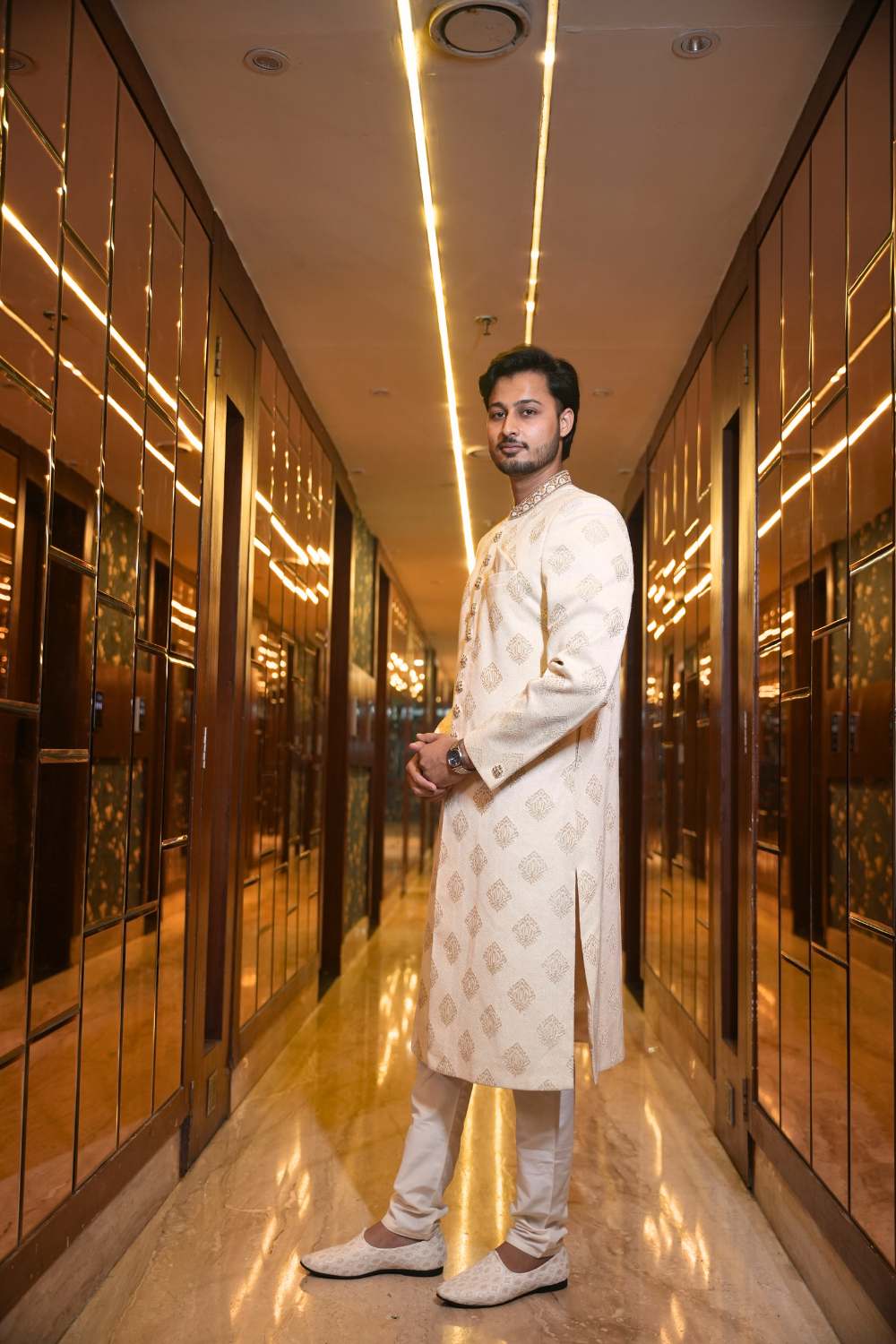 Beige Sherwani Set With White Churidar And Gold Brocade Motifs3